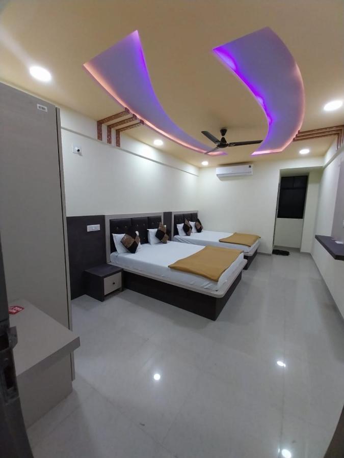 Hotel Ggc Inn 阿穆达巴 外观 照片