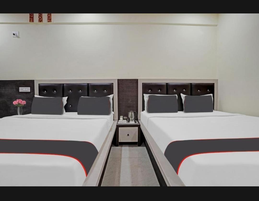 Hotel Ggc Inn 阿穆达巴 外观 照片